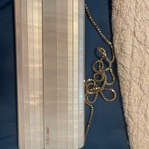 Jimmy Choo acrylic clutch with gold chain